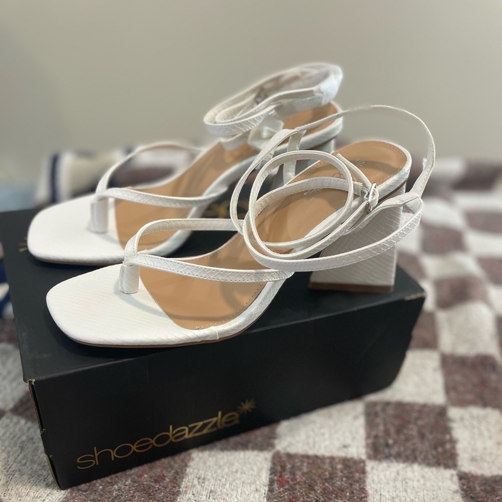Size 10, White thong 3 inch sandals.
